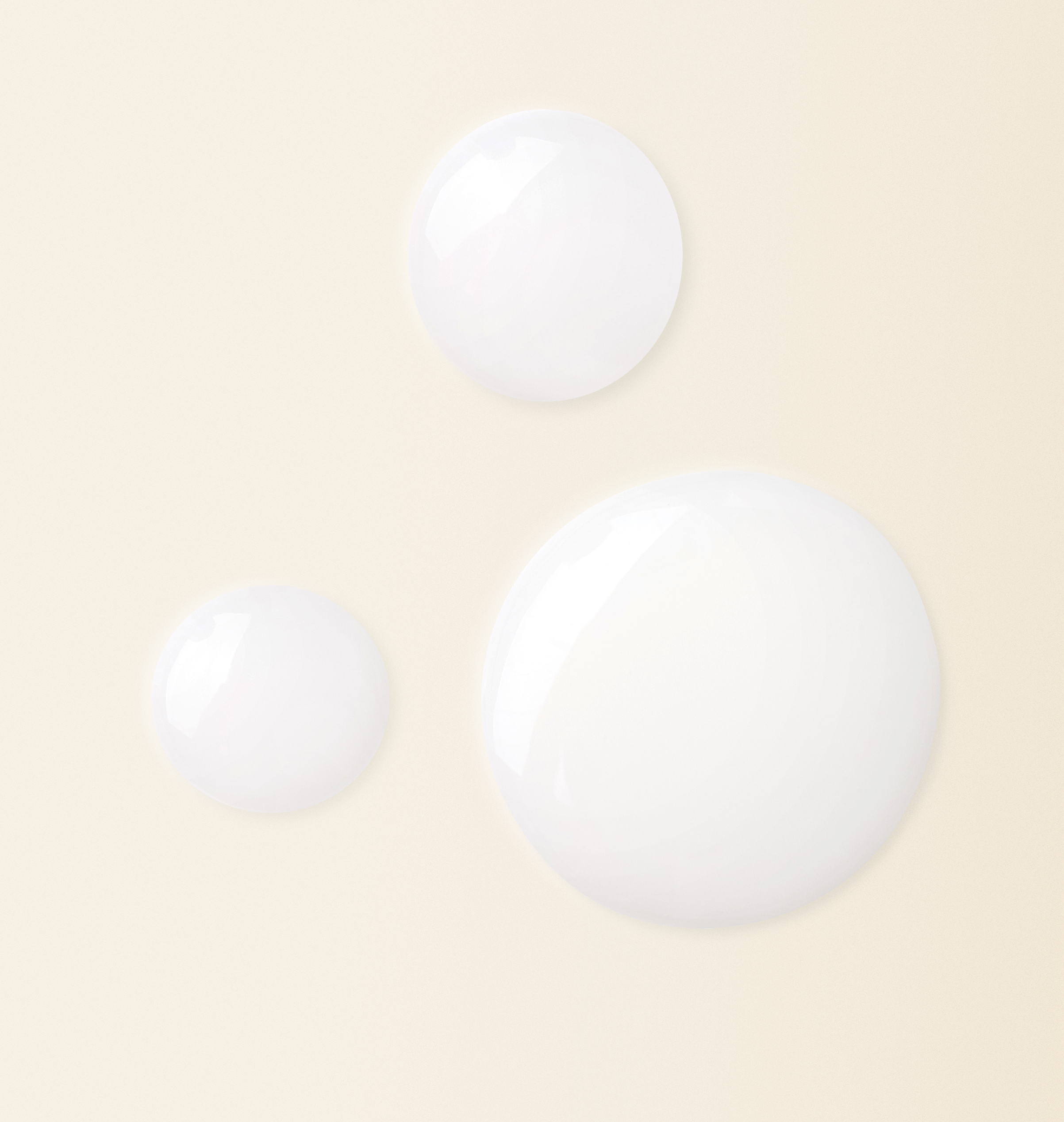 Product texture shot of Dr Loretta Barrier Enhancing Milky Essence sold at Heyday